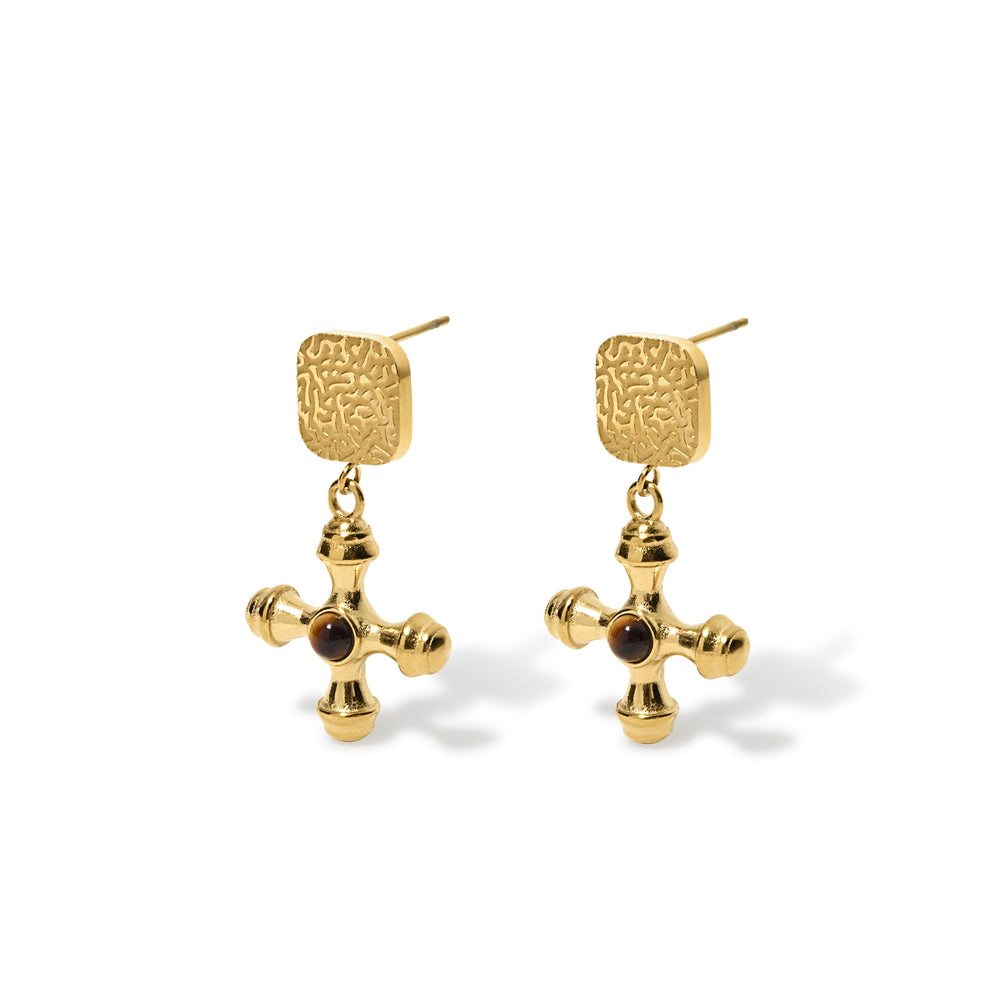 olivia le gold cross earrings with square detail on top and brown tigerseye stone embedded in the cross