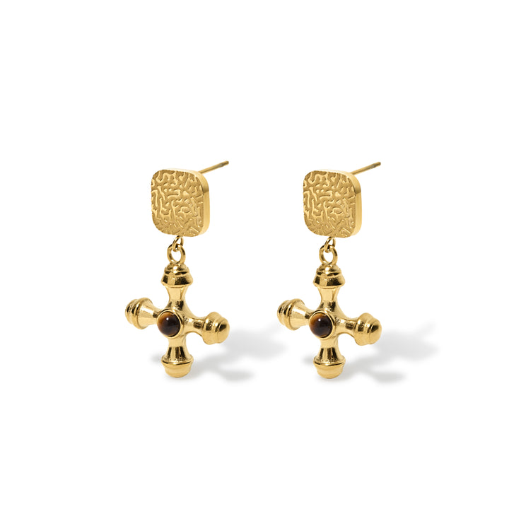 olivia le gold cross earrings with square detail on top and brown tigerseye stone embedded in the cross
