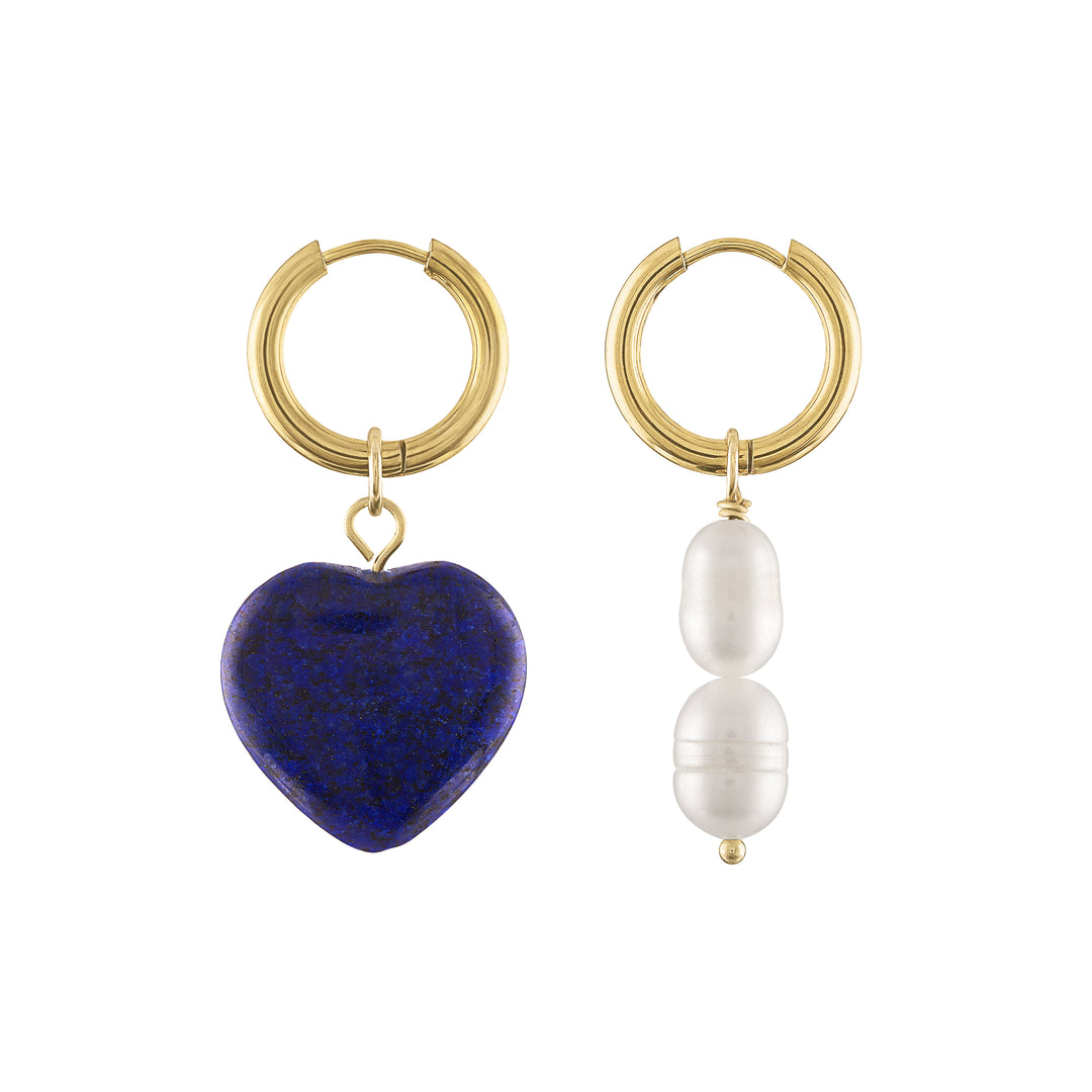 Olivia le aubrey lapis heart hoop earrings shown with gold hoop earrings and a blue heart charm on one earrings and pearl charms on the other earring as mismatched earring sets