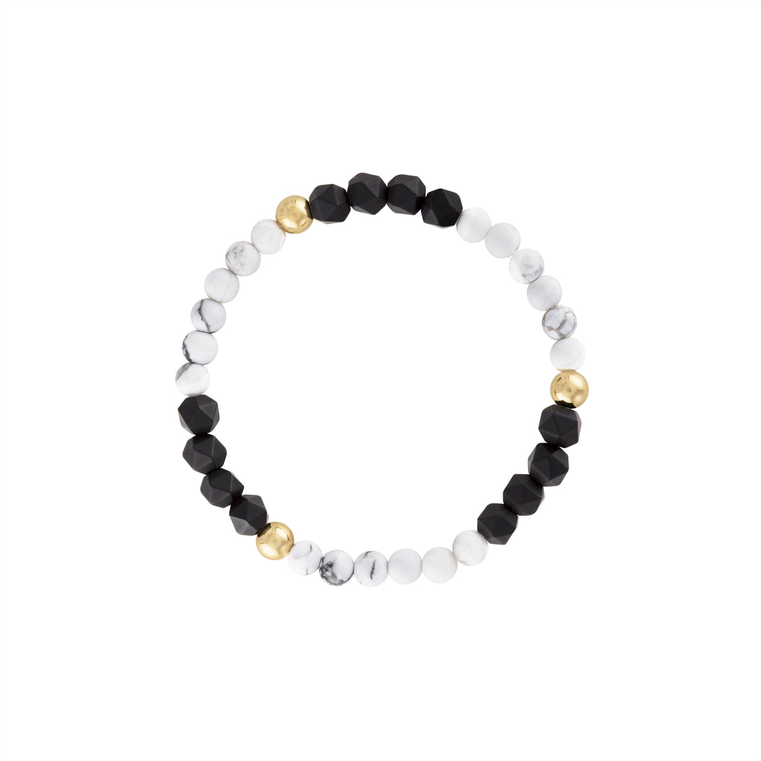 Olivia Le Dreamy Black & White Gem Bracelet handmade with 5MM 14K gold-filled beads 4MM howlite gemstones and 6MM black matte star faceted onyx gemstones available in 6.5 inch or 7 inch stretch 