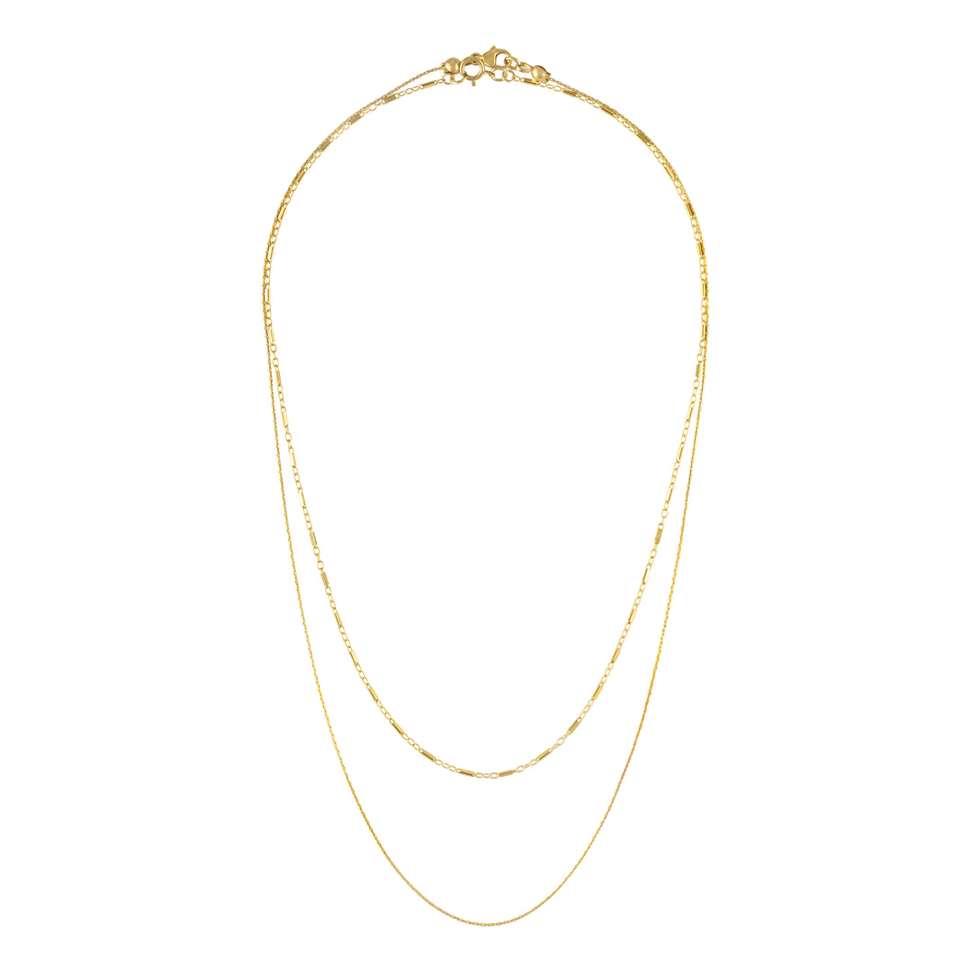 Olivia Le Jayden stack necklaces shows 2 necklaces that can be layered . Both necklaces are 14k gold filled dainty chains. One necklace is shorter at 14 inches and the other necklace is a thin beading chain that is longer at 17 inches