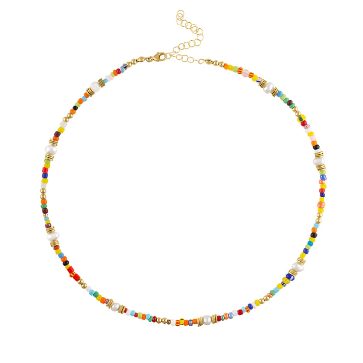 Olivia Le Jetsetter necklace shows a circular beaded necklace with multicolor bright beads and freshwater pearls and gold plated brass discs along with glass seed beads finished with a lobster clasp and extender 