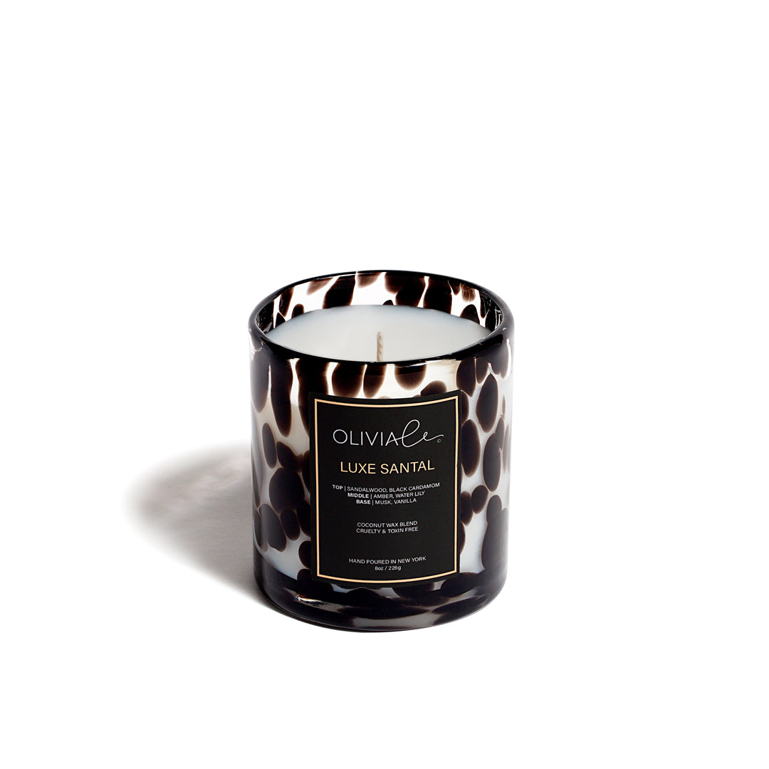 Olivia Le Luxe Santal Leopard candle in 8 and 16 ounces.