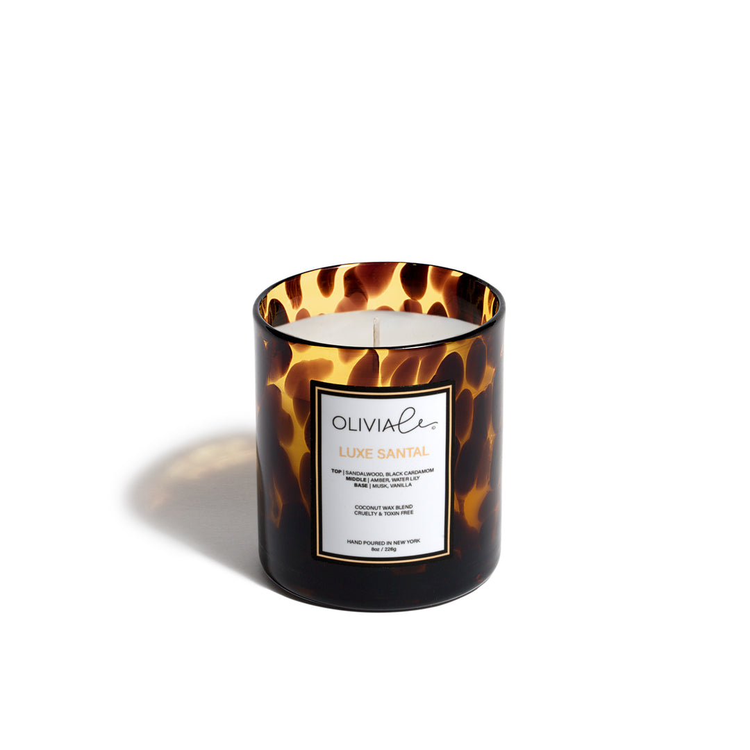 Olivia Le Luxe Santal Tortoise candle in 8 and 16 ounces.