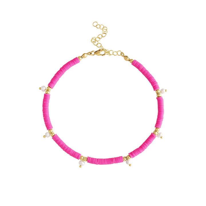 Olivia Le Neon Pearl Anklet features hot pink polymer clay heishi beads with small 3mm gold filled beads that surround a small freshwater pearl charm decoration there are 6 pearls around the anklet and the anklet itself is adjustable from 8 inches to 10 inches finished with a lobster clasp and extender