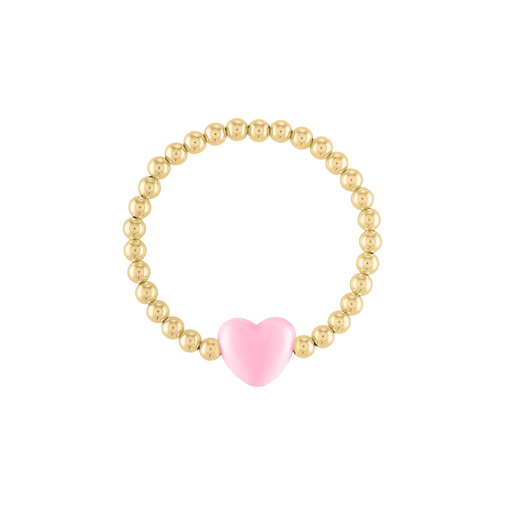 Olivia le love heart bracelet shown with 5mm 14k gold filled round beads with a large pastel pink puff heart bead charm in the middle on a stretch bracelet