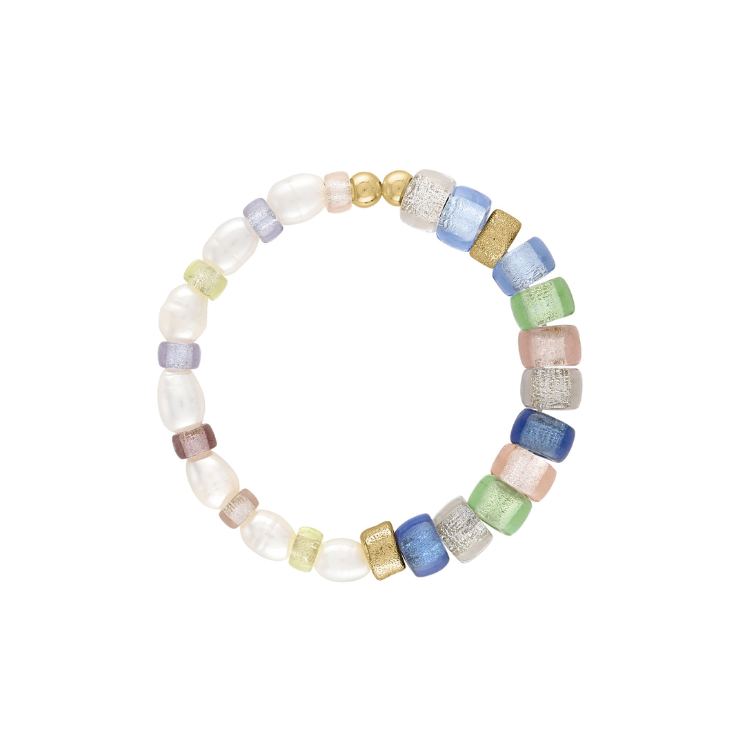 Olivia Le delphine glass bead bracelet is beaded with half of the bracelet with freshwater pearls and the other half of the bracelet with glass czech beads and finished with gold filled beads on a stretch bracelet