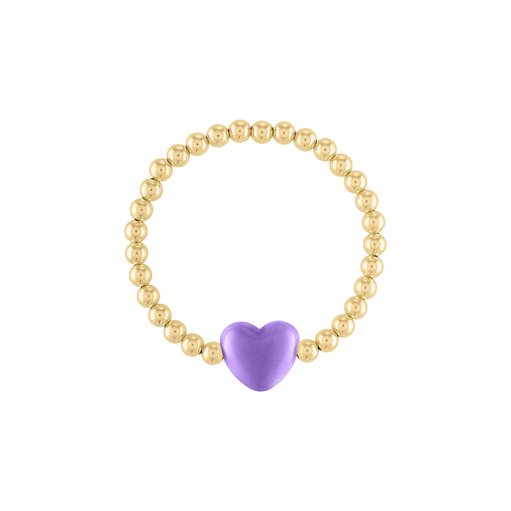 Olivia le love heart bracelet shown with 5mm 14k gold filled round beads with a large pastel purple puff heart bead charm in the middle on a stretch bracelet