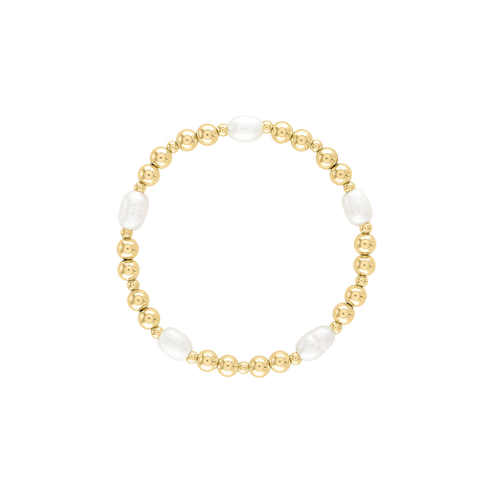Olivia Le pearla bracelet shown with 5mm and 3mm gold  filled beads with alternating pattern and medium sized freshwater pearls beaded on a stretch bracelet