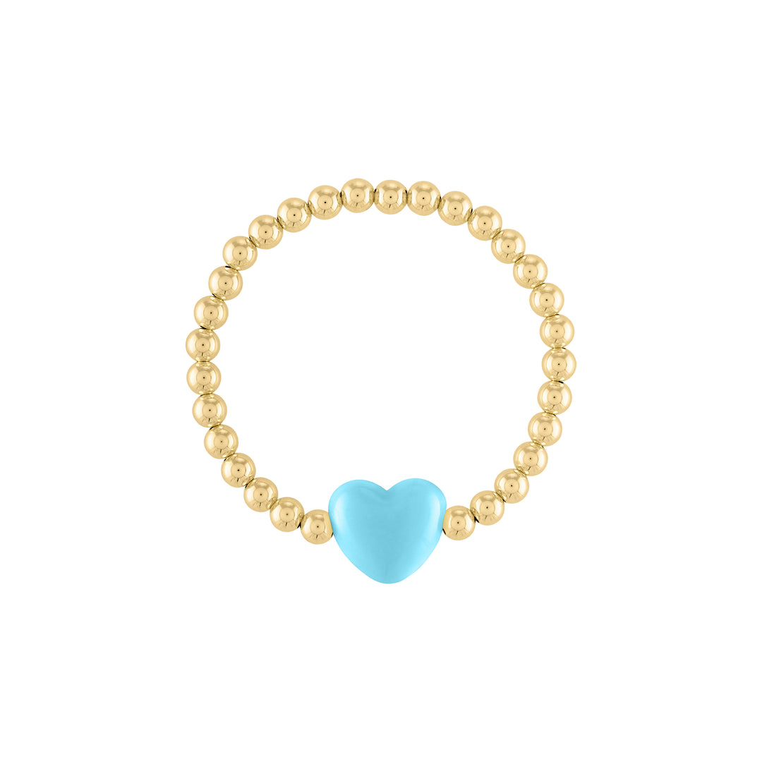 Olivia le love heart bracelet shown with 5mm 14k gold filled round beads with a large pastel aqua puff heart bead charm in the middle on a stretch bracelet